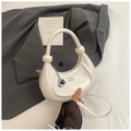 White crescent PU leather bag with circular handle and silver G pendant accessory - White