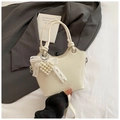 Chic cream white bucket bag with pleated texture and elegant pearl heart pendant - White