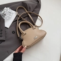 Chic beige shell-shaped crossbody bag with lychee texture and silver hardware - Khaki