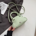 Mint green lychee texture shell handbag with silver hardware and thin shoulder strap - Green
