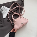 Pink lychee grain leather shell bag with silver hardware and detachable strap - Pink
