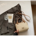 Beige woven bucket bag with brown leather trim and metal logo for summer style - No Pendant / White and Brown