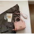 Pink crossbody bucket bag with textured weave and knot handle detail for women - No Pendant / Pink