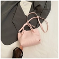 Fashionable light pink woven bucket bag with cylindrical handles and adjustable strap - Pink