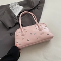 Pink faux leather shoulder bag with white pearls and silver star studs detail - Pink