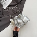 Silver metallic bucket bag with pleated texture, chain strap, and pearl bow charms - Silver