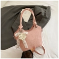 Pink retro bucket tote bag with embossed text and pearl bow charm detail - Pink