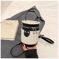 White woven bucket bag with black trim and silver metal spherical zipper pulls - Black