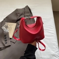 Chic vibrant red lychee texture crescent handbag with silver metal buckle and shoulder strap - Red