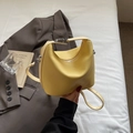 Chic yellow lychee texture leather handbag with silver lock and crossbody strap - Yellow