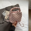 Pink quilted bucket bag with rhinestones and a stylish woven handle for women - Pink