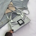 Silver snakeskin leather crossbody bag with square buckle and bow handle design - Silver