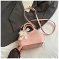 Pink minimalist bucket bag with vintage pleated texture and pearl heart charm - Pink