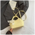 Cream bucket bag in wrinkled texture with pearl heart charm and shoulder strap - Yellow