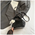 Chic black bucket bag with pearl heart charm and adjustable strap for summer fashion - Black