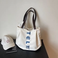 Borsa tote in tela bianco sporco con manici in pelle marrone e ricamo blu di classe - Bianco Sporco