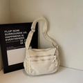 Minimalistische beige Segeltuchtasche mit Mehrschicht-Reißverschluss und breitem Gurt - Gebrochenes Weiß