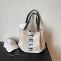 Borsa tote in tela bianco sporco con spalline marroni e ricamo blu per uso quotidiano - Cachi