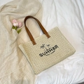 Beige geweven strooien draagtas met Summer borduursel en bruine lederen handvaten - Wit
