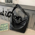 Minimalist black large capacity tote bag in soft PU leather with adjustable strap - Black Large