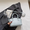 Light blue faux crocodile bucket bag with round handles and adjustable strap for women - Blue Without Charm