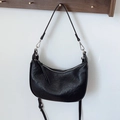 Minimalist black hobo shoulder bag in soft pleated faux leather with silver metal zipper - Black
