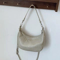 Chic beige crescent moon shoulder bag with pleated leather texture and dual straps - Off-white