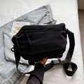 Fashionable black nylon crossbody bag with multi-zipper compartments and adjustable strap - Black