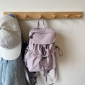 Minimalist light purple nylon backpack in soft pastel tone with side buckles - Purple