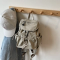 Minimalist khaki beige backpack with drawstring closure and black buckle detail - Khaki