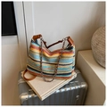 Detail of rainbow striped woven bag with brown leather handles and chic metal chain - Rainbow Small