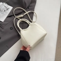 Sac seau minimaliste blanc cassé avec motif litchi, doubles poignées et bandoulière - Blanc Crème (Sans Pendentif)