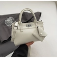 Chic beige tote bag with a matching envelope pouch and silver metal twist lock closure - White Without Pendant