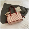 Vertical red striped canvas tote bag with leather handles and plush puppy charm - Red with Pendant