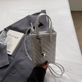 Silver metallic woven mini bucket bag with heart charm and shoulder strap for women - Silver