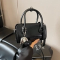 Fashionable black patent leather bowling bag with heart charm and silver chain strap - Black With Pendant