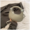 Detail of light green pleated handbag with round bead accents and detachable strap - Gray
