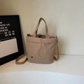 Minimalist khaki drawstring bucket bag in nylon with adjustable crossbody strap - Khaki