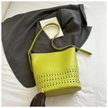 Fashionable lime green hollowed-out bucket bag with laser-cut floral patterns and strap - Green