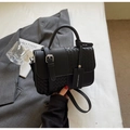 Detail einer Vintage-Patchwork-Handtasche mit gewebtem Leder und Metallschnallen-Akzenten - Schwarz Groß