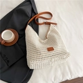 Macro detail of creamy hollow woven tote bag with premium brown leather strap and logo - Off White