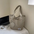 Waterproof nylon tote bag in khaki beige with small coin purse and letter patch detail - Khaki