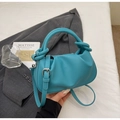 Detail of turquoise cloud bag with knotted handle and adjustable leather strap - Blue