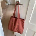Brick red canvas tote bag with black letter print and wide handles for women - Brown