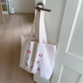 Large cream canvas tote bag with red letter print and spacious shoulder straps - White