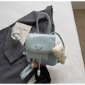 Light blue vintage backpack with crinkled texture, mini logo plate and bear pendant - Blue with Pendant