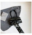 Trendy black handbag featuring a large bow and silver studs with twin top handles - Black