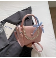 Pink niche design shoulder bag with lace trim, ribbon handle and pleated leather texture - Pink