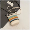 Detail of colorful woven straw bucket bag with adjustable cream leather strap and texture - Multicolor with White