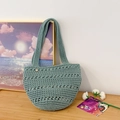 Handmade crochet hollow woven tote bag in sage green with wooden button closure - Green